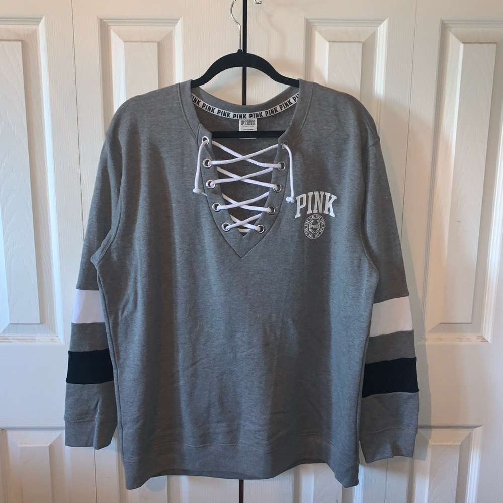 PINK sweater with lace up detailing